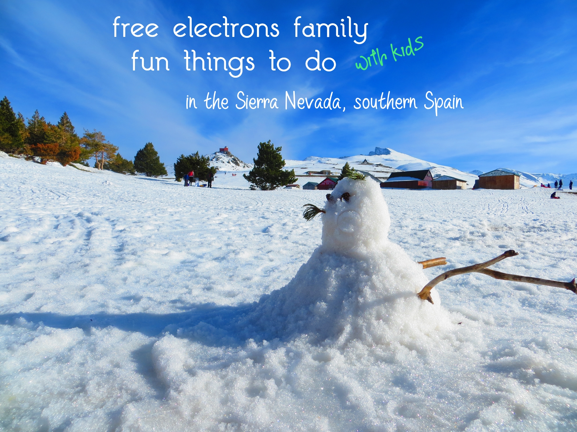 Frosty the Snowman. . . or snow dog atop Hoya de la Mora in the Sierra Nevada, Spain.

Photo text reads: free electrons family fun things to do with kids in the Sierra Nevada, southern Spain.