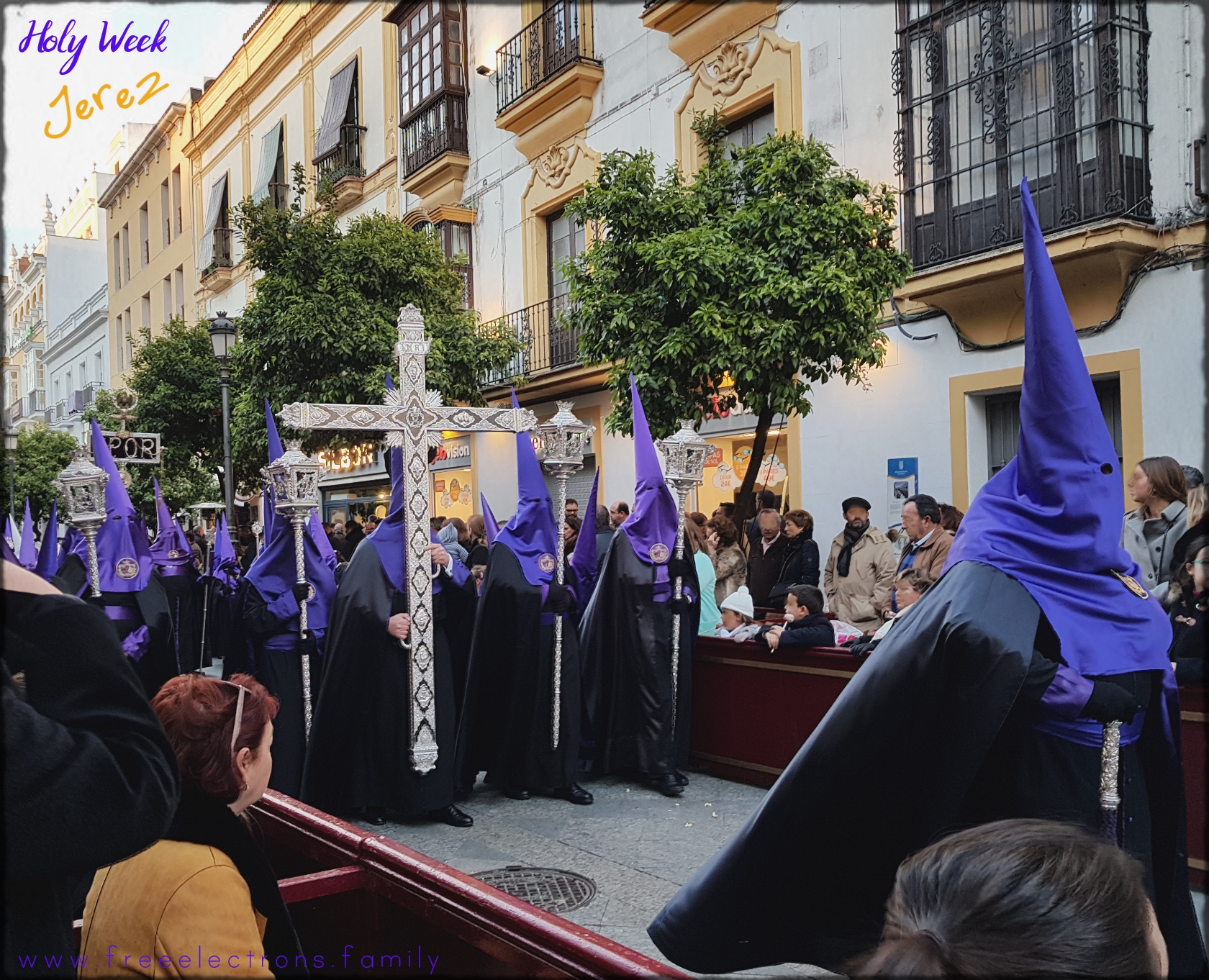A procession of piety during Holy Week (Semana Santa) along Calle Larga, Jerez de la Frontera, Spain.