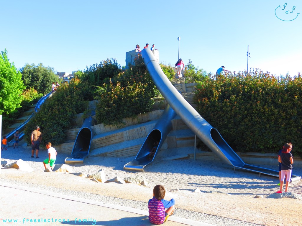 #FreeElectrons.Family - camping road trip Europe, Madrid Rio. An interesting set of slides in a playground at Madre Rio to add more awesome activities for your children.