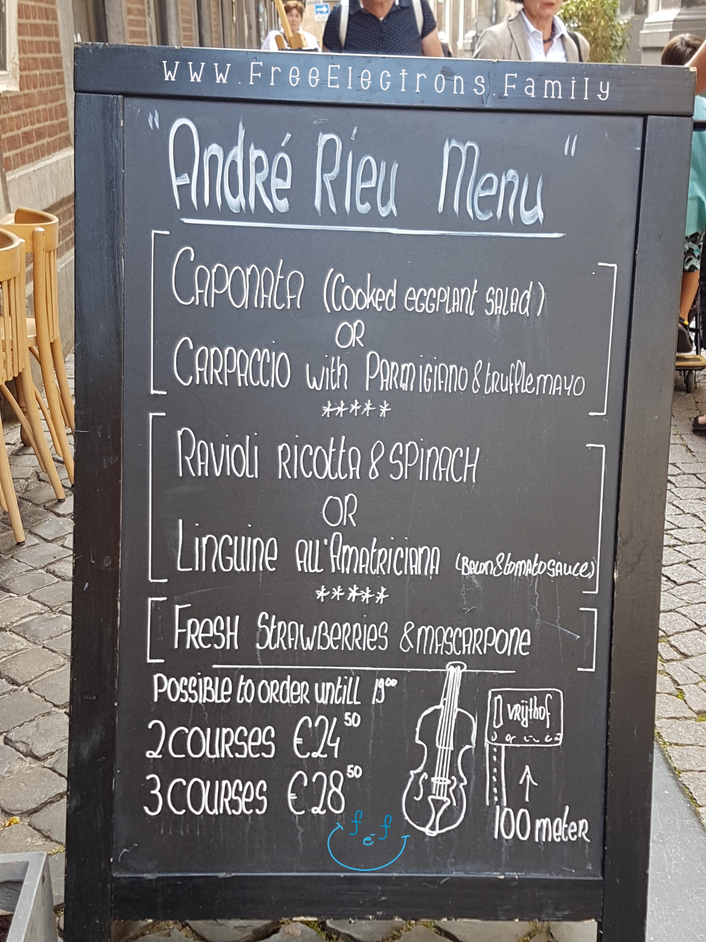 Maastricht, the city of Andre Rieu.  A restaurant advertises an "Andre Rieu Menu,"  Showing a 3-course meal for 28.50 euros (a 100 meters from the concert stand).

#FreeElectrons.Family - camping road trip Europe Maastricht