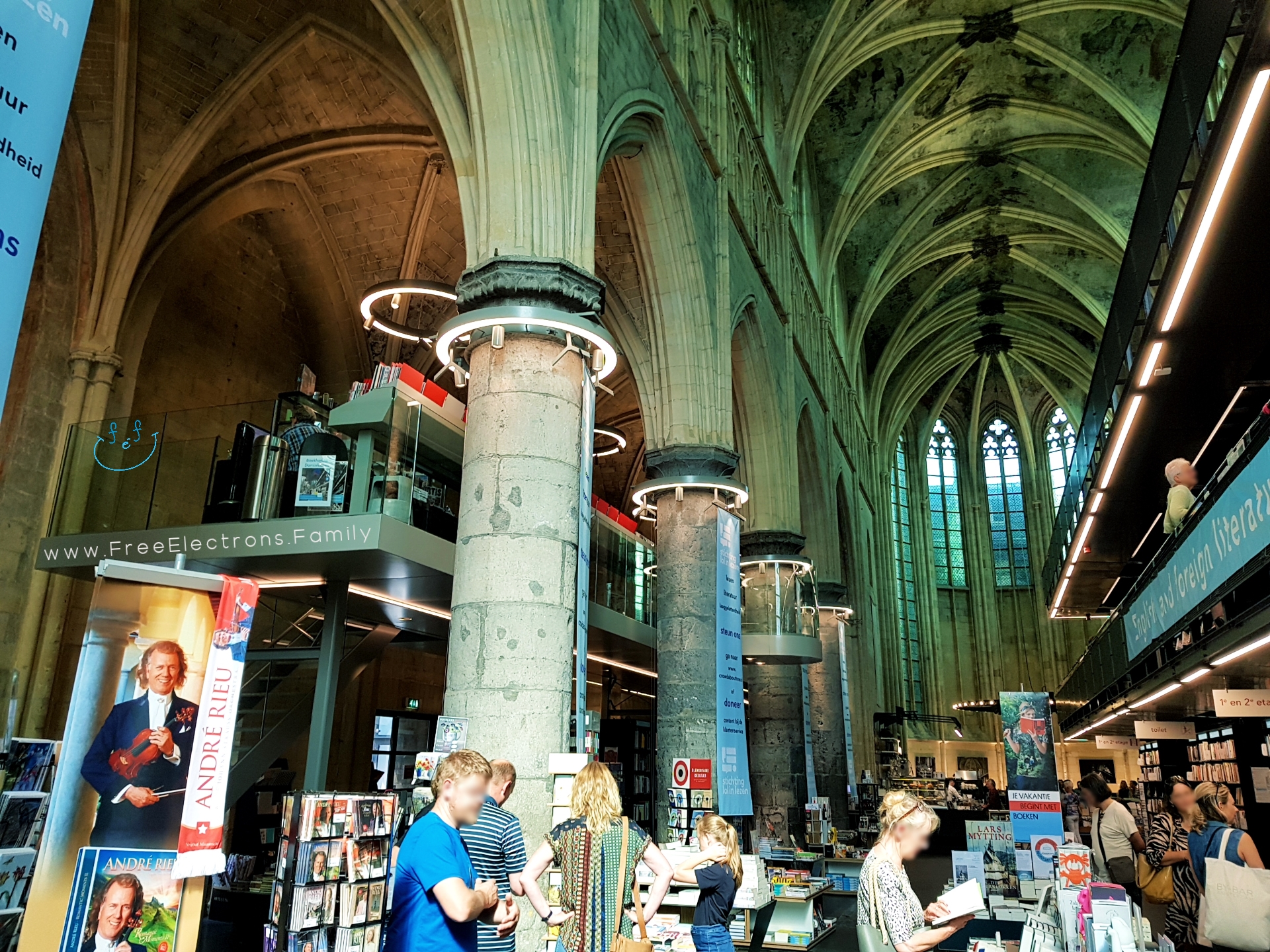 Random people in a Dominican-monastery-converted bookstore.

#FreeElectrons.Family - camping road trip Europe Maastricht.