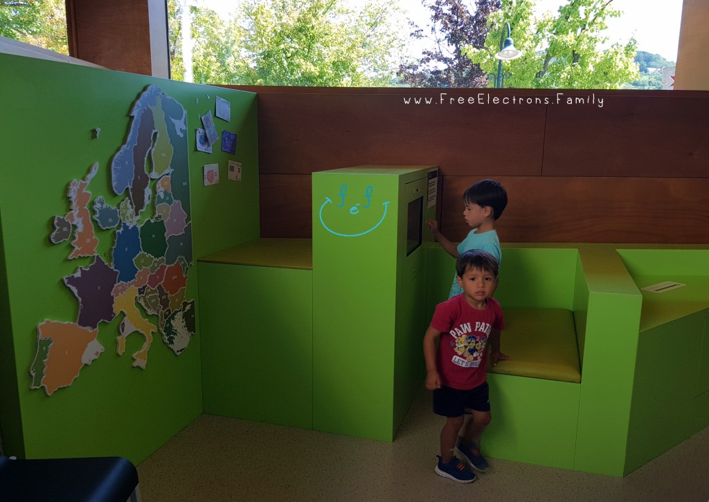 Two young boys engage in interactive activities at an area for children inside the European museum of Schengen.

www.FreeElectrons.Family