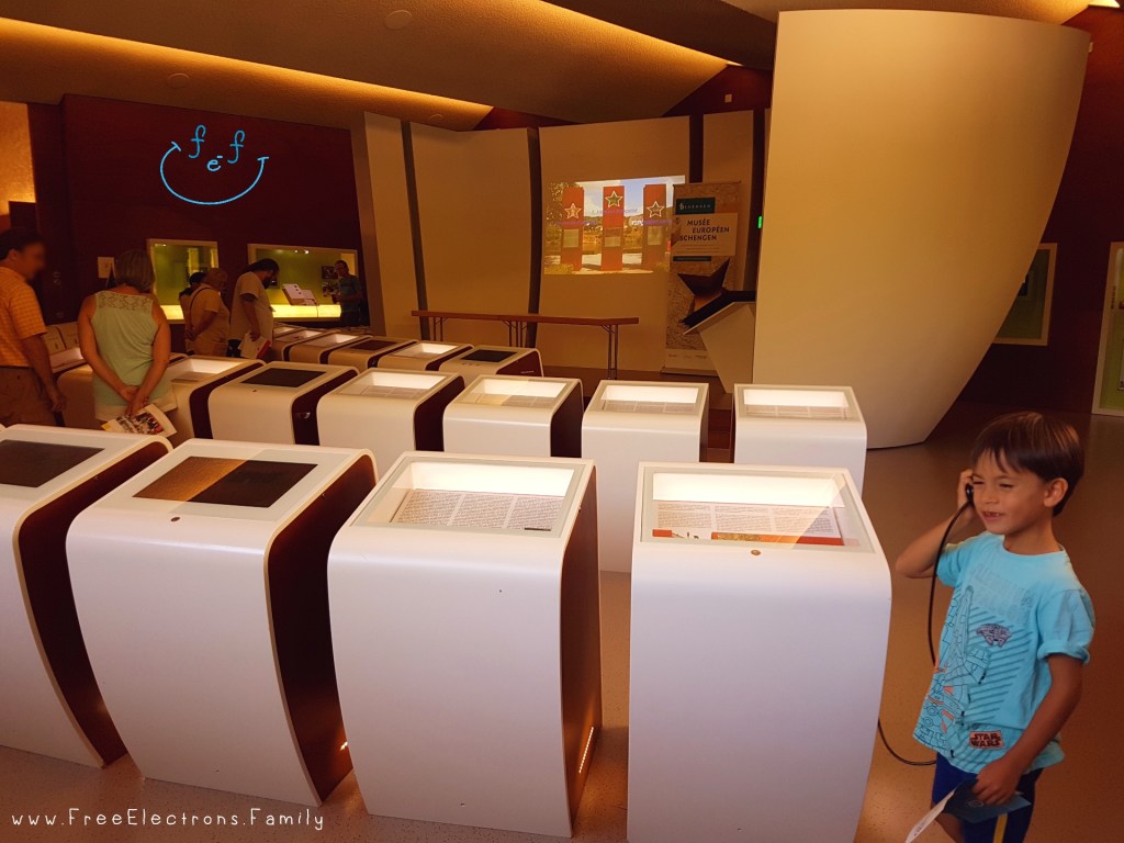A young boy smiles as he listens to one of the interactive modules inside the European museum of Schengen.

www.FreeElectrons.Family