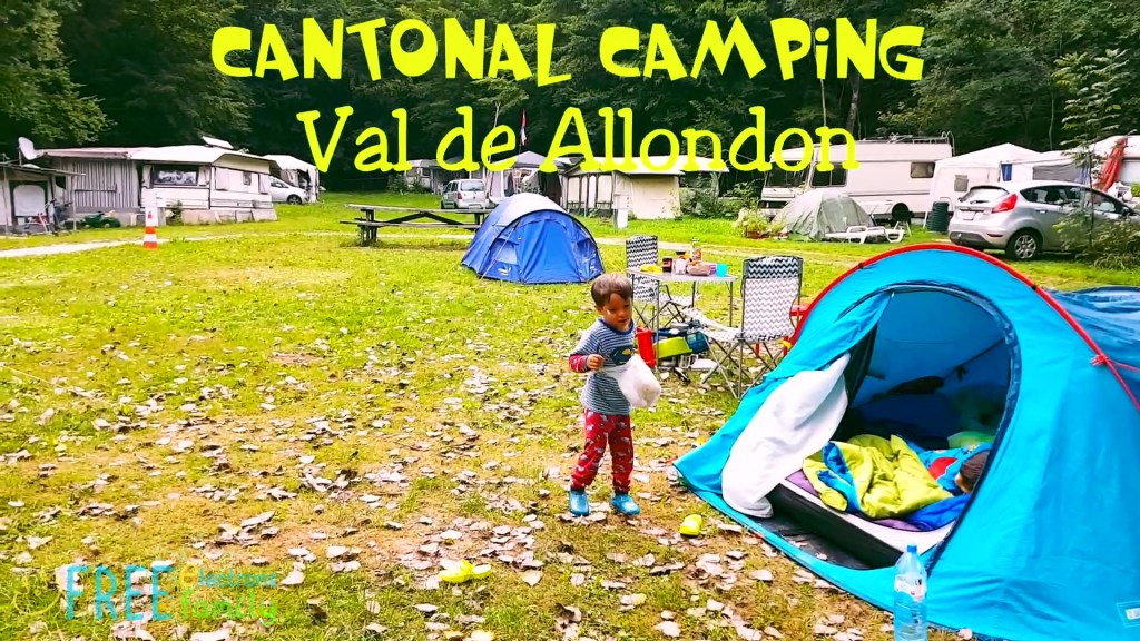 A young kid playing outside a tent in a idyllic-looking campsite. 

Text reads: Cantonal Camping Val de Allondon.

www.FreeElectrons.Family