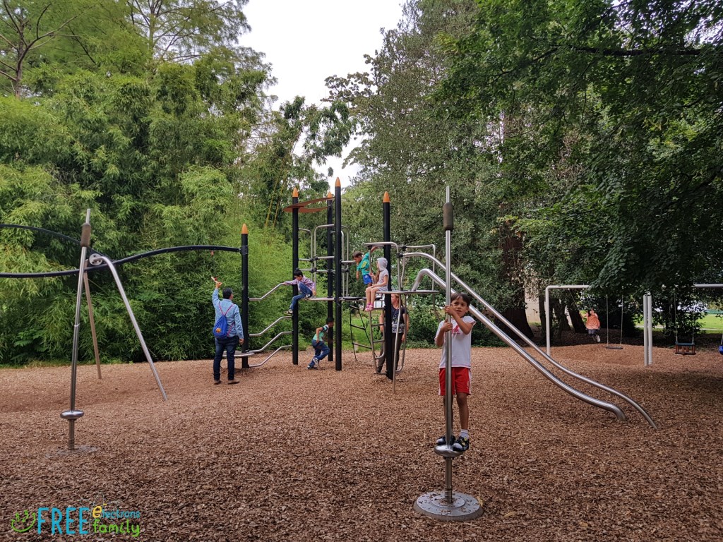 Kids at play in a playground with well-trimmed ground cover from wood cuttings and shade from surrounding trees.

www.FreeElectrons.Family