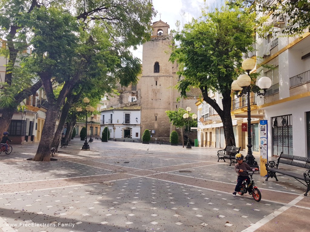 Two young boys on bicycles in a small plaza/square, Plaza Plateros, Jerez de la Frontera during coronavirus lockdown in Spain.

www.FreeElectrons.Family  