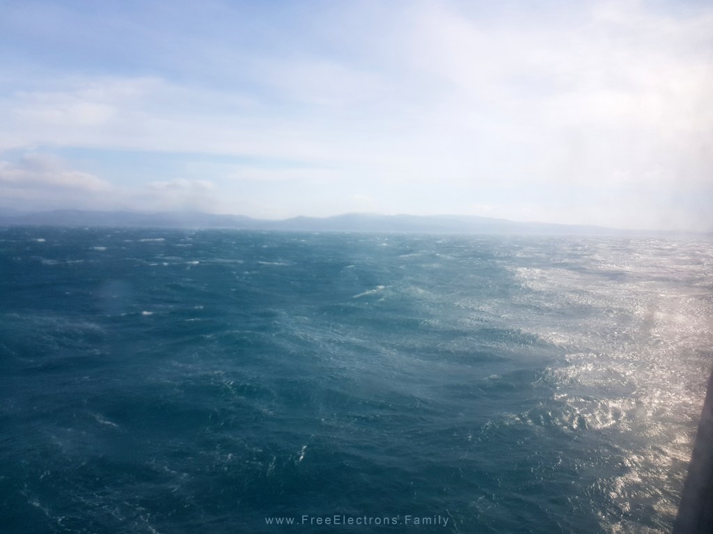 The Rif mountains of Morocco seen through a glass of a ferry crossing the strait of Gibraltar.